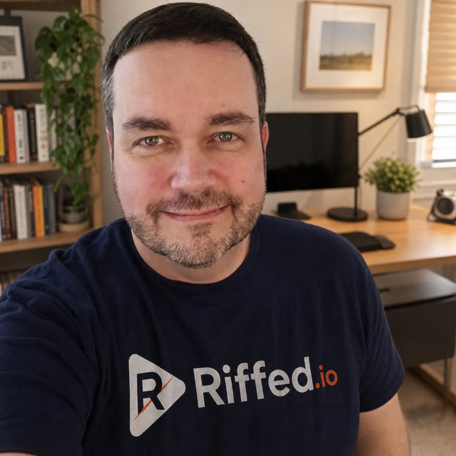 Bill, the founder of Riffed, in a home office wearing a Riffed.io t-shirt